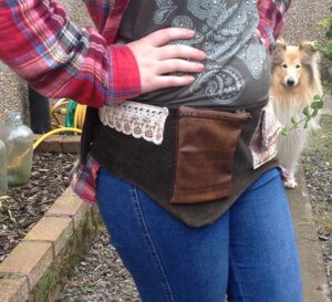 Festival/Utility belt on Eve photo bombed by dog