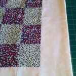 Patchwork quilt ironed