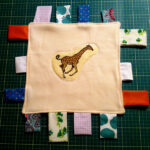Baby taggie blanket
